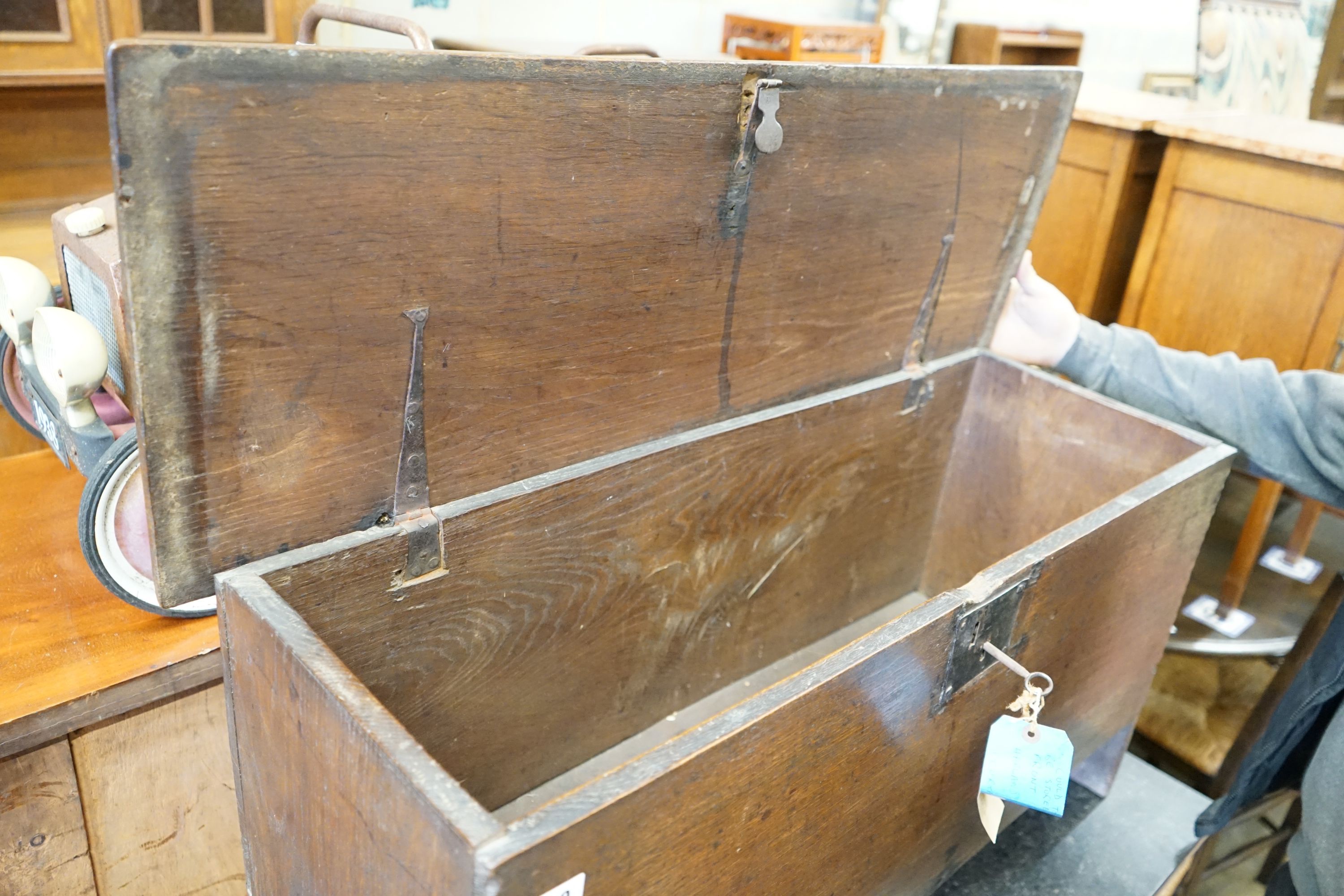 A late 17th / early 18th century oak six plank chest, length 98cm, depth 36cm, height 49cm